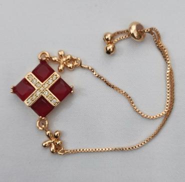 Gold plated red bracelet with silver pearls